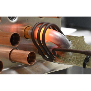 ระบบทำความร้อนแบบเหนี่ยวนำสำหรับงานหนัก ออกแบบมาเพื่อสายการผลิตในโรงงาน พร้อมระบบควบคุมอุณหภูมิที่แม่นยำและพลังงานที่เชื่อถือได้ - Product Image 1