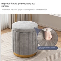 Fauteuil de salon cylindrique à rayures verticales en polaire avec bordure dorée, style luxe léger, forme cylindrique, support stable