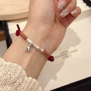 Bracelet en argent pur 999, cordon rouge tissé en bambou, bijoux unisexes à porter au quotidien - Product Image 1