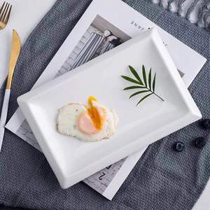 Assiette de table <span class=keywords><strong>rectangulaire</strong></span> <span class=keywords><strong>en</strong></span> céramique pour hôtel, à bord épais et profilé créatif, pour fruits, modèle cœur, ustensile de cuisine - Product Image 1
