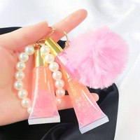 Porte-clés élégant 3-en-1 personnalisé avec pendentif boule de fourrure, brillant à lèvres végétalien hydratant longue durée aux minéraux, chaîne de perles mignonne, liquide brillant