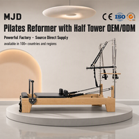Reformer de Pilates professionnel en bois avec demi-tourneuse, équipement d'exercice assisté par la tour pour la mise en place en studio et le fitness à domicile