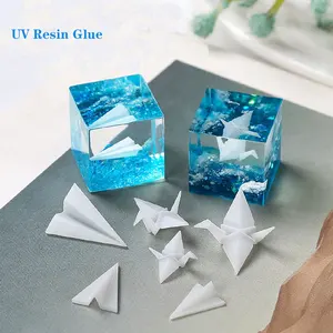 OEM barato claro duro cura de resina UV de pegamento UV pegamento líquido transparente Curable, resina de epoxy, joyería de madera, artesanías blanco pegamento líquido Diy