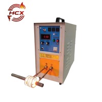 Machine de chauffage par induction à haute fréquence personnalisée industrielle portable HCX pour le trempeage de surface des métaux