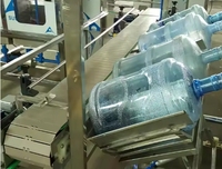 Machine de remplissage d'eau pure électrique automatique 500 ml, haute productivité, moteur à économie d'énergie, PLC pour boissons, Dubaï