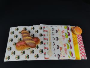 กระดาษห่ออาหารกันไขมันสำหรับแฮมเบอร์เกอร์และพิซซ่า พิมพ์ลายโลโก้ รุ่น SP2981 กระดาษคราฟท์แบบผนังเดียว เกรดสำหรับอาหาร - Product Image 2