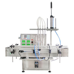 Máquina de llenado automática de cuatro cabezales con bomba magnética de 220V de alta precisión para botellas de líquidos - Product Image 4