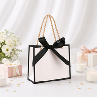 Petite quantité en commande, fabricant chinois CSMD, emballage prêt à expédier, sac cadeau blanc fantaisie pour emballage de cadeaux de mariage