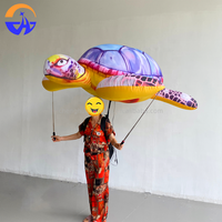Accessoires interactifs de tortue de mer à main et de style sac à dos pour les défilés de carnaval en plein air Tortue de mer gonflable géante Animal marin