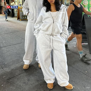 All'<span class=keywords><strong>ingrosso</strong></span> <span class=keywords><strong>abbigliamento</strong></span> da <span class=keywords><strong>donna</strong></span> elegante 2025 con logo personalizzato tuta in pile a due pezzi a gamba larga pantaloni della tuta e Set con cappuccio con Zip - Product Image 1