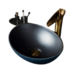 Lavabo de salle de bain en céramique ovale bleu et noir, design contemporain, écologique, à poser sur comptoir - Product Image 1