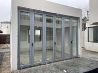 Porte en aluminium écologique, portes pliantes, porte coulissante en verre hermétique avec profil thermique pour une construction durable