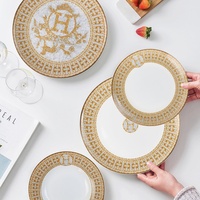 Service de table en céramique dorée de style européen, luxe léger, avec assiettes et tasses à café en porcelaine fine pour hôtels et restaurants occidentaux