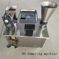 Machine automatique pour la fabrication de raviolis carrés, samosas, rouleaux de printemps, empanadas et pastels