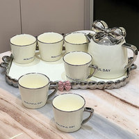 Luxuriöses Modernes Keramik-Porzellan-Teeservice Kreatives Windbogen-Kaltgetränke-Set mit Kanne, Tasse und Tablett Umweltfreundliches Hochwertiges JADE Marken-Milchset
