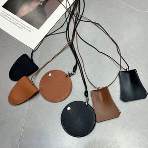 Estuche Redondo de Cuero PU para Auriculares, Bolsa de Almacenamiento para Auriculares Bluetooth con Cordón para Colgar, Elegante y Compacta - Product Image 1