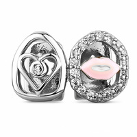 Bestseller transfrontalier Double-grillz en laiton ajouré avec zircon ovale croisé, bijoux hip-hop style urbain pour hommes