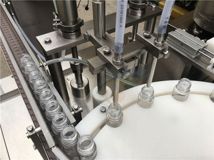 Machine de remplissage et de bouchage automatique de bouteilles en verre pour boissons et produits chimiques, contrôlée par un PLC - Product Image 4