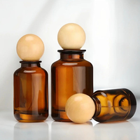 Vente en gros d'usine, flacon pulvérisateur de parfum en verre rechargeable de 30 ml, 50 ml, 100 ml, cylindrique, avec bouchon en bois