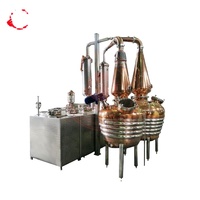 Alambic double en cuivre avec pompe et moteur pour la distillation sécurisée de spiritueux, whisky, gin et alcool neutre