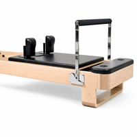 Machine de Pilates professionnelle en bois d'érable canadien, équipement de Pilates en bois d'érable, couleur et logo personnalisés en cuir pour les distributeurs mondiaux