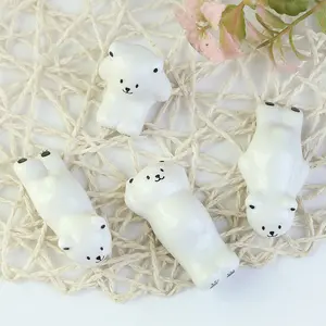 hot sale bear shape white porcelain chop stick and spoon stand chopstick rest ceramic chopstick holder