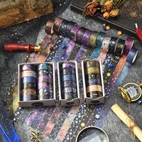Ensemble de rubans washi style galaxie cosmique mystérieuse avec motifs étoiles, lune et soleil imprimés en feuille, pour les amateurs de journal intime et la décoration de carnets