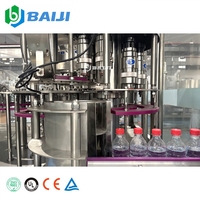 Machine de remplissage et d'embouteillage automatique de boissons gazeuses et de limonade au prix d'usine en Chine