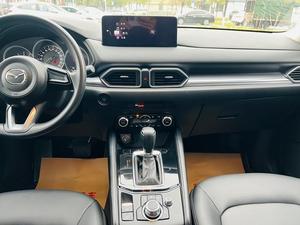 <span class=keywords><strong>MAZDA</strong></span> <span class=keywords><strong>CX5</strong></span> 2024 <span class=keywords><strong>USADO</strong></span>, 2.0L, AUTOMÁTICO, 2WD, EDICIÓN COMFORT, 5 PUERTAS, 5 ASIENTOS, SUV DE GASOLINA, 155 CV, INHALACIÓN NATURAL, COLOR DORADO SOBRE NEGRO - Product Image 5