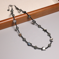 Collier en coquillage noir naturel pour femme Collier ras du cou perlé en forme de chat naturel Énergie de guérison Collier en pierre semi-précieuse