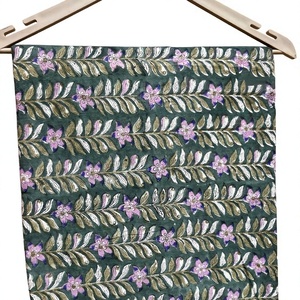 Premium dark <b>green</b> hand block print cotton fabric unstitched suit material featuring traditional purple floral vertical vines - Product Image 1