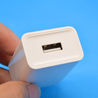 Chargeur US EU Prix compétitif Prise 5V2A Tête de charge 10W adaptée au chargement des téléphones portables et des appareils électriques