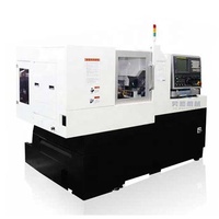 Machine de tour cnc de type suisse à 7 axes à lit plat en chine sm205 avec chargeur de barre hydraulique