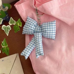 Porte-clés et pendentif de sac à main à nœud à carreaux bleu, rose, blanc et noir, style simple, mignon et doux - Product Image 1