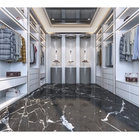 Armoire d'angle multifonctionnelle sur mesure avec rangement intégral, portes coulissantes et optimisation de l'espace pour chambre à coucher