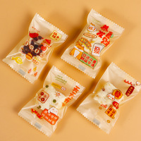 Vente en gros de sacs d'emballage pour biscuits flocons de neige, sacs transparents scellés à la machine pour biscuits et nougats, et sacs d'emballage à motifs de dessins animés