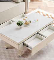 Table basse électrique moderne Voxhome avec plateau en verre, tiroirs de rangement et roulettes pour le mobilier de salon