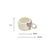 Mug à café, thé, lait ou eau en céramique mignon de style INS avec un nœud 3D sur la poignée en forme de perle