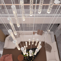 Lustres de luxe en cristal de verre transparent à tube long suspendu pour escalier de villa