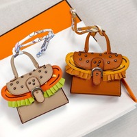 Porte-clés mignon en forme de mini-hamburger, porte-monnaie, étui pour écouteurs et rouge à lèvres avec motif géométrique en cuir