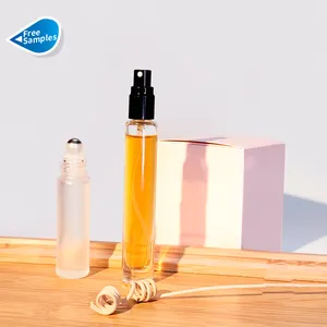 Empty Fragrance Atomizer Cosmetic Packaging Clear 8ml 9ml 10 ml round Perfume Glass Bottle with Spray Pump Cap