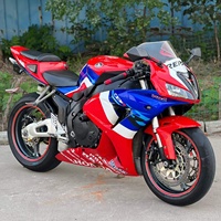 Moto de course sur circuit d'occasion Honda CBR1000RR 1000cc, quatre cylindres, sportive, rouge Repsol