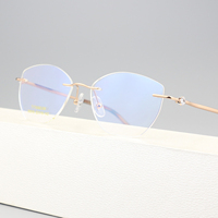 Vente directe d'usine S6018 Lunettes ovales sans monture en titane pur unisexe, classiques, durables, pour adultes, toutes formes de visage, livraison rapide