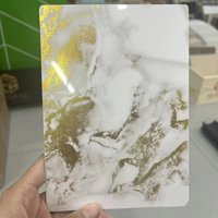 Hoja de mármol de Pvc de alta calidad al por mayor, espesor más delgado, precio más favorable, Panel de pared Spc, diseño de madera dorada PET