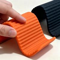 Support de tablette mobile pliable en silicone à fixation flexible, antidérapant, design créatif, angle réglable, personnalisable pour bureau et lit