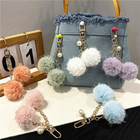 Porte-clés et pendentif de sac en peluche douce et luxueuse avec perle, design bonbon frais Journée de la Terre, pour voiture et étui d'écouteurs
