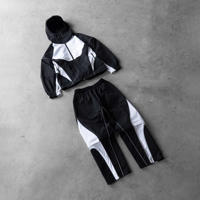 Conjunto Deportivo de 2 Piezas con Pantalones Desmontables, Chaqueta Cortavientos de Nailon Ligero y Transpirable con Diseño de Parches para Hombre