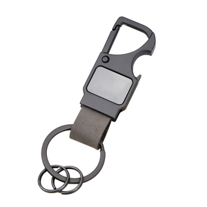 Nouveau porte-clés transfrontalier en cuir véritable multifonctionnel avec décapsuleur, porte-clés créatif pour homme, pendentif métallique gravé au laser - Product Image 1