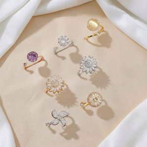Women cross-border micro-inlaid flower Rotation <b>Ring</b> OEM ODM Service Luminous Inlay Solid Metal Construction Mixed wholesale - Product Image 1
