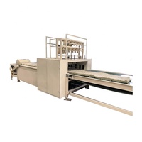 Machine à coudre entièrement automatique pour panneaux rigides et matelas en laine de roche minérale souple et fibre de verre